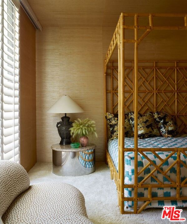 40471 Sand Dune Road Rancho Mirage, CA 92270 - Photo 23 of 42 a bedroom with a bed and a window