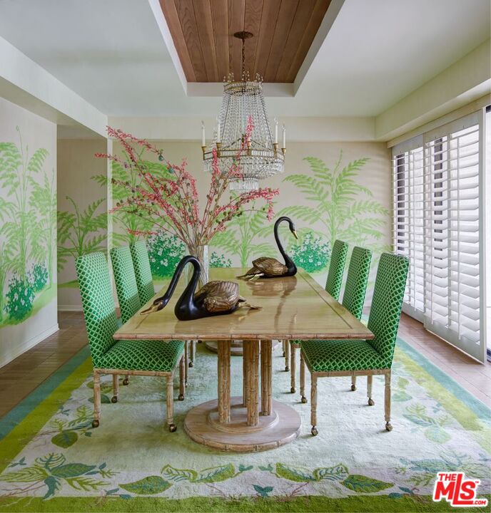 40471 Sand Dune Road Rancho Mirage, CA 92270 - Photo 24 of 42 a view of a dining room with furniture window and wooden floor