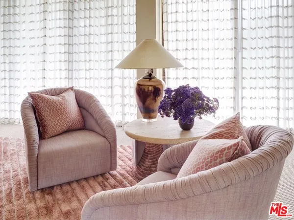 a front view of house with outdoor space and sitting space