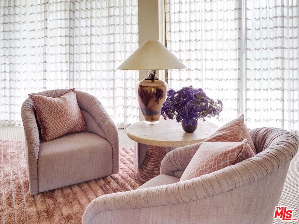 40471 Sand Dune Road Rancho Mirage, CA 92270 - Photo 28 of 42 a living room with furniture and a lamp