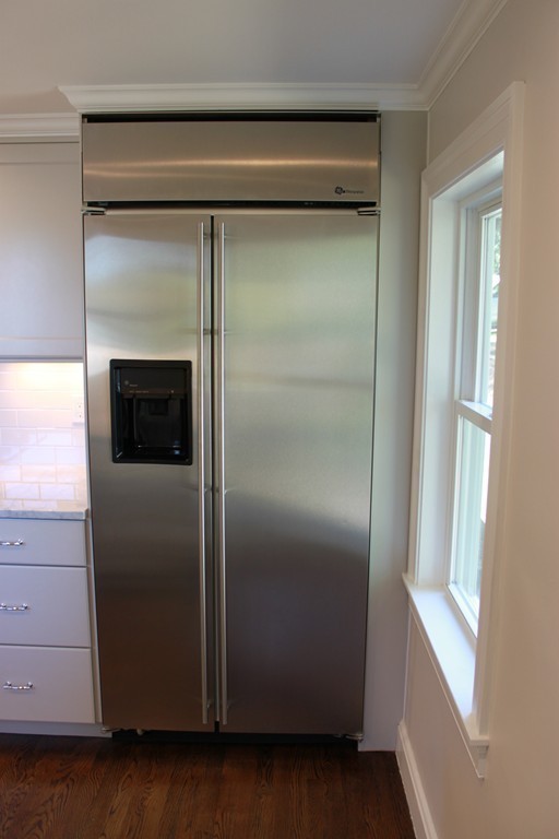 52 Roundwood Road Newton, MA 02464 - Photo 8 of 19 a close view of a refrigerator in kitchen