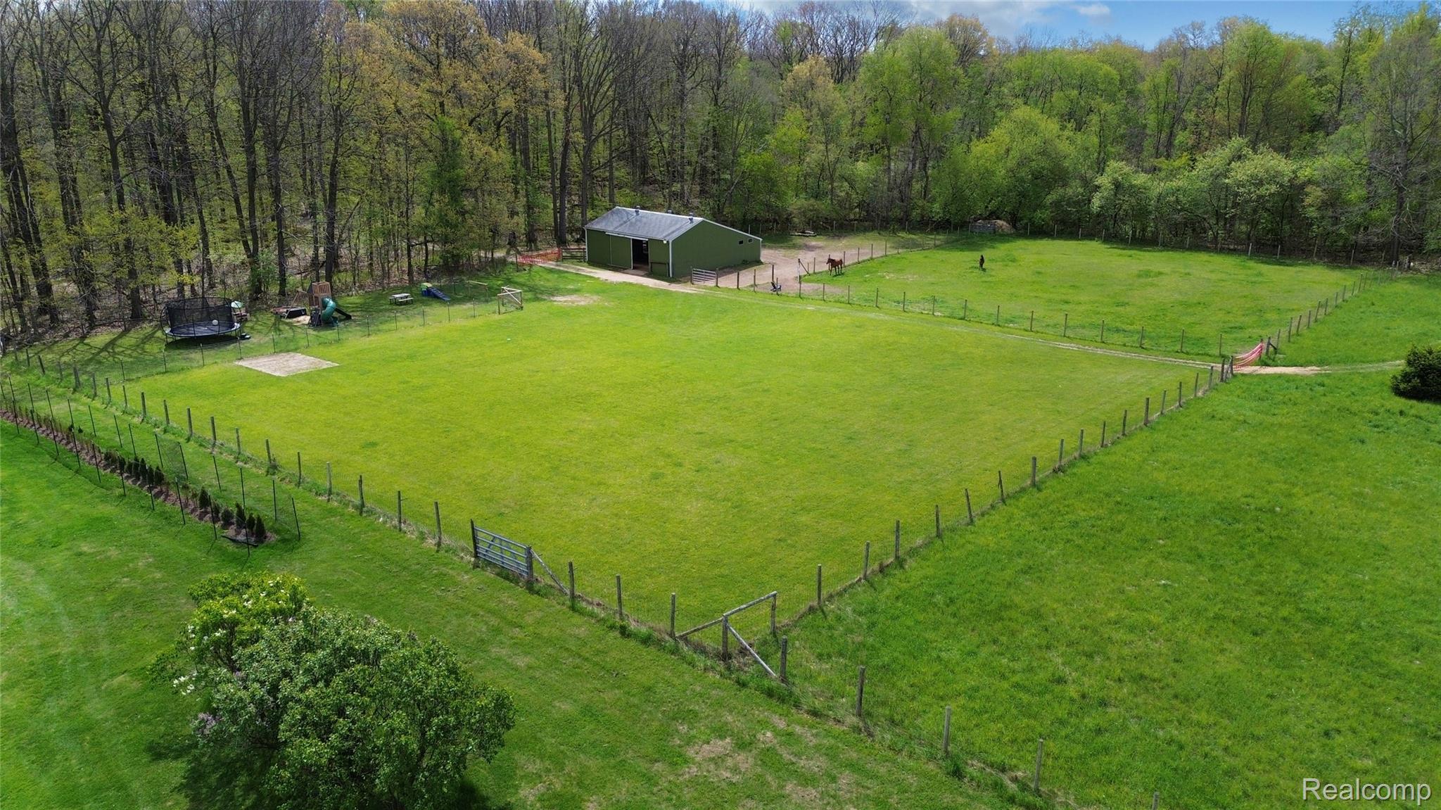 3910 Joy Road Metamora, MI 48455 - Photo 4 of 26 Aerial view of sparsely populated area featuring a pastoral area