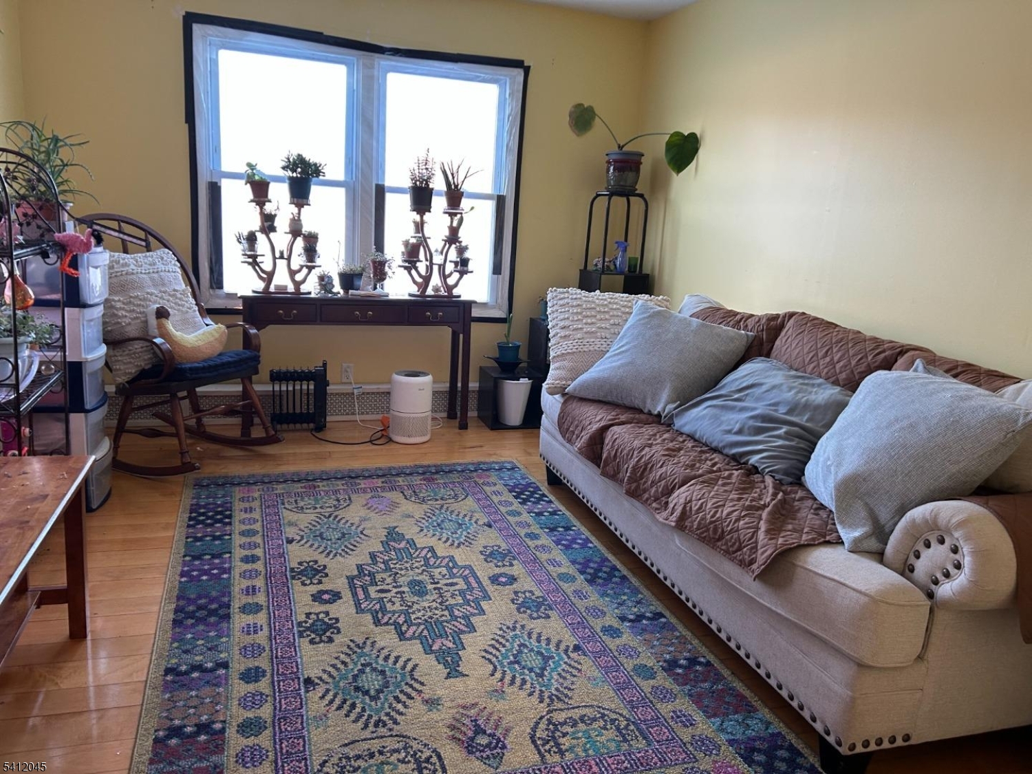 73 Featherbed Lane Flemington, NJ 08822 - Photo 18 of 22 a living room with furniture and a large window