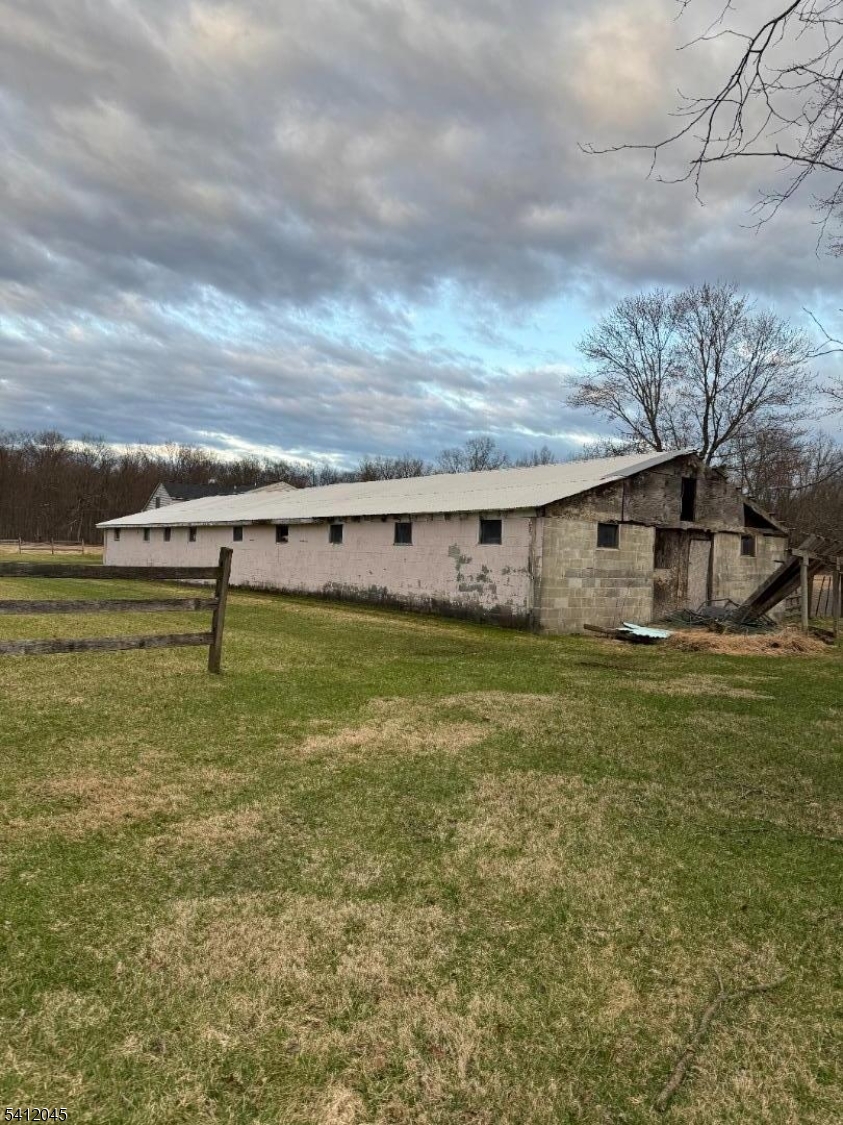 73 Featherbed Lane Flemington, NJ 08822 - Photo 4 of 22 a view of a big yard with an empty space