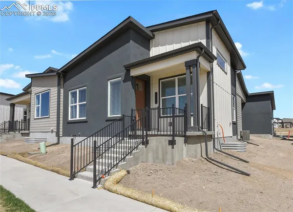 a front view of a house with a porch