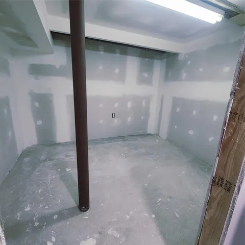 a view of a big room with a fireplace