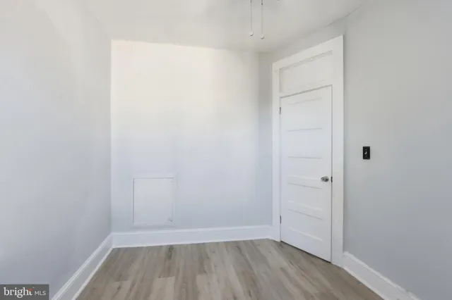 a view of small space with wooden floor