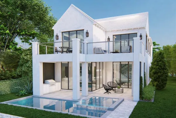 a view of a house with backyard porch and sitting area