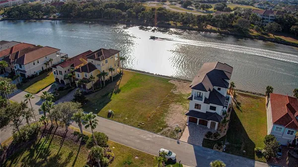 an aerial view of a house with outdoor space