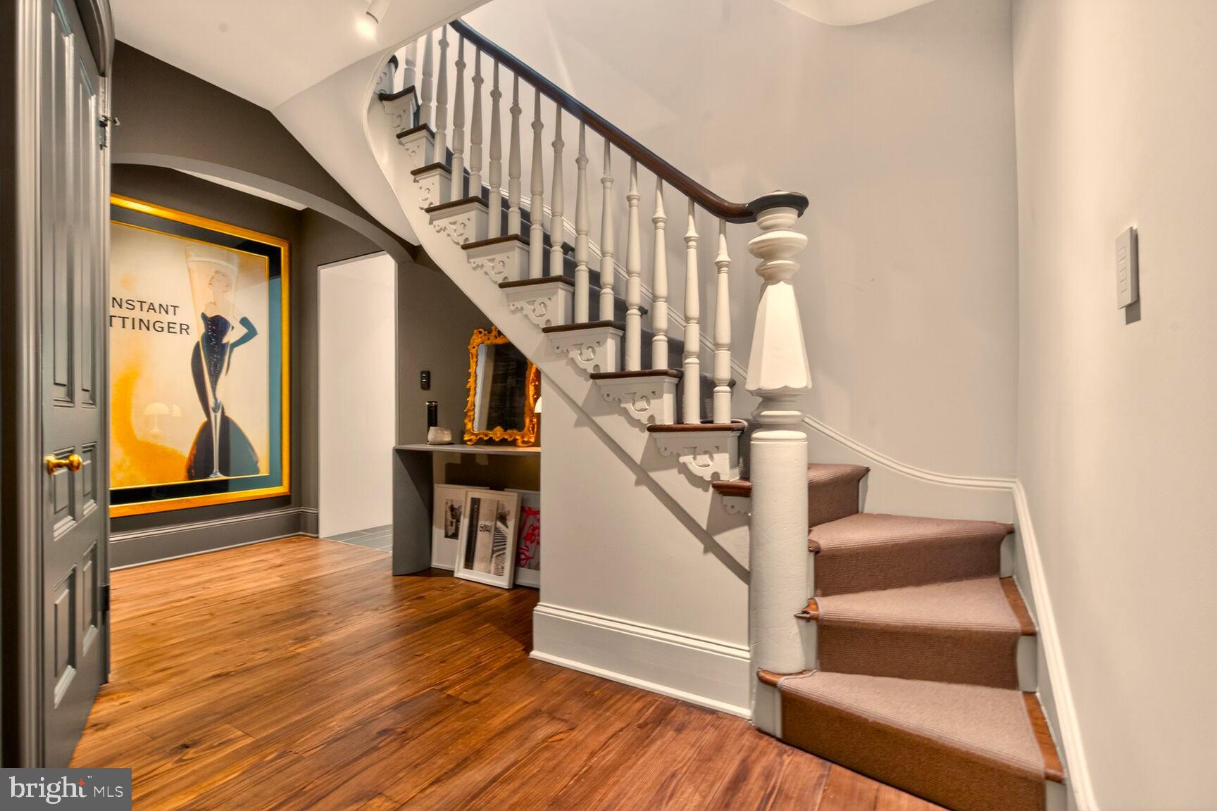1524 29th Street Northwest Washington, DC 20007 - Photo 4 of 26 a view of entryway and hall with wooden floor