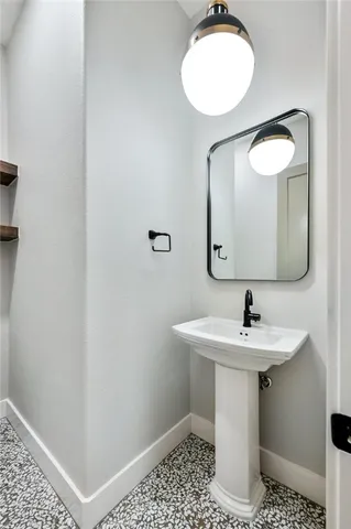 an empty room with a window and a ceiling fan