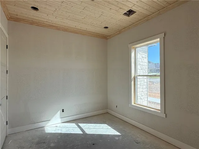 a view of a house with a large window