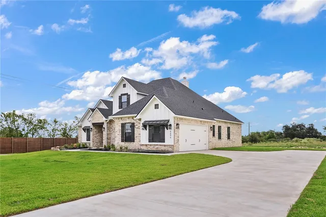 a view of outdoor space yard and front view of a house