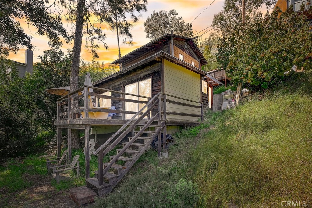 a backyard of a house with lots of green space