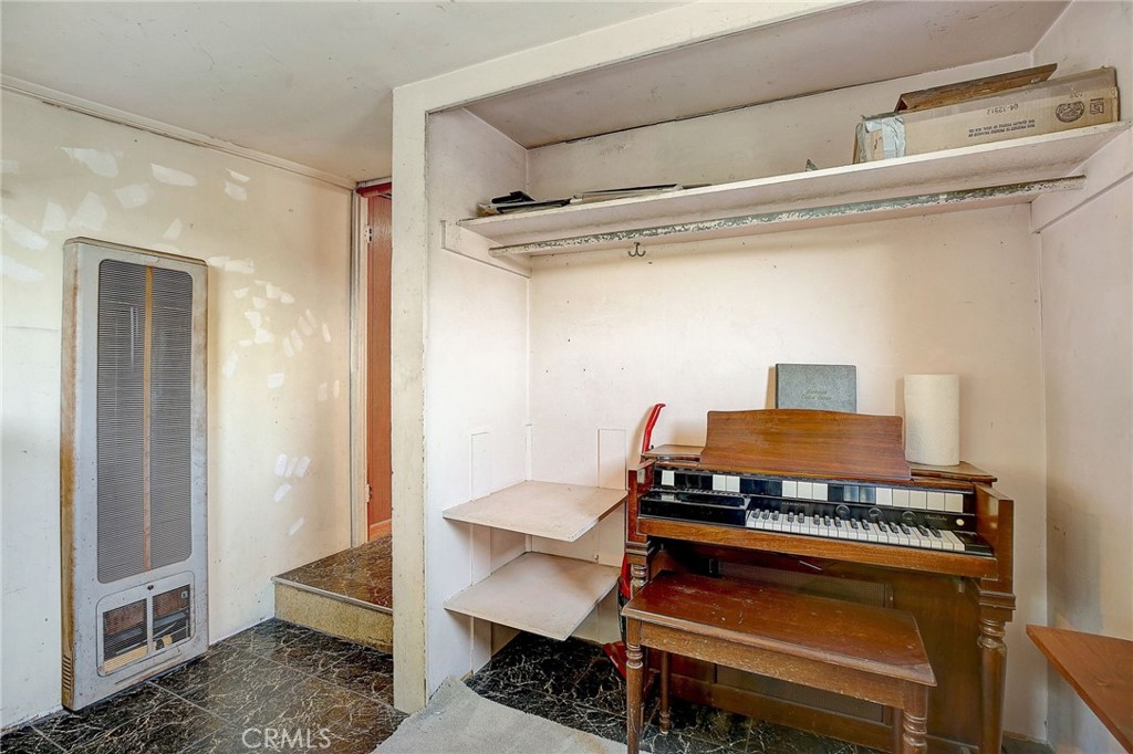 755 Crane Boulevard Los Angeles, CA 90065 - Photo 19 of 40 a view of an empty room with wooden floor