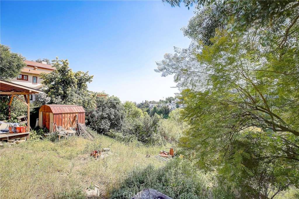 755 Crane Boulevard Los Angeles, CA 90065 - Photo 26 of 40 a view of a house with a yard