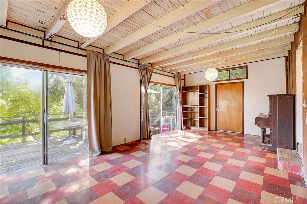 755 Crane Boulevard Los Angeles, CA 90065 - Photo 9 of 40 a spacious bedroom with a bed and a large window