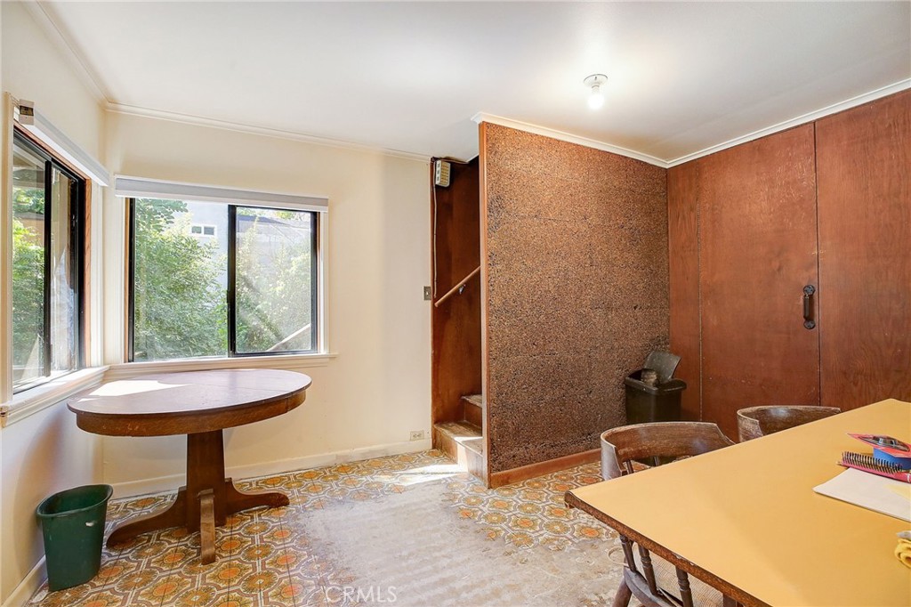 755 Crane Boulevard Los Angeles, CA 90065 - Photo 10 of 40 a bedroom with a bed and a table