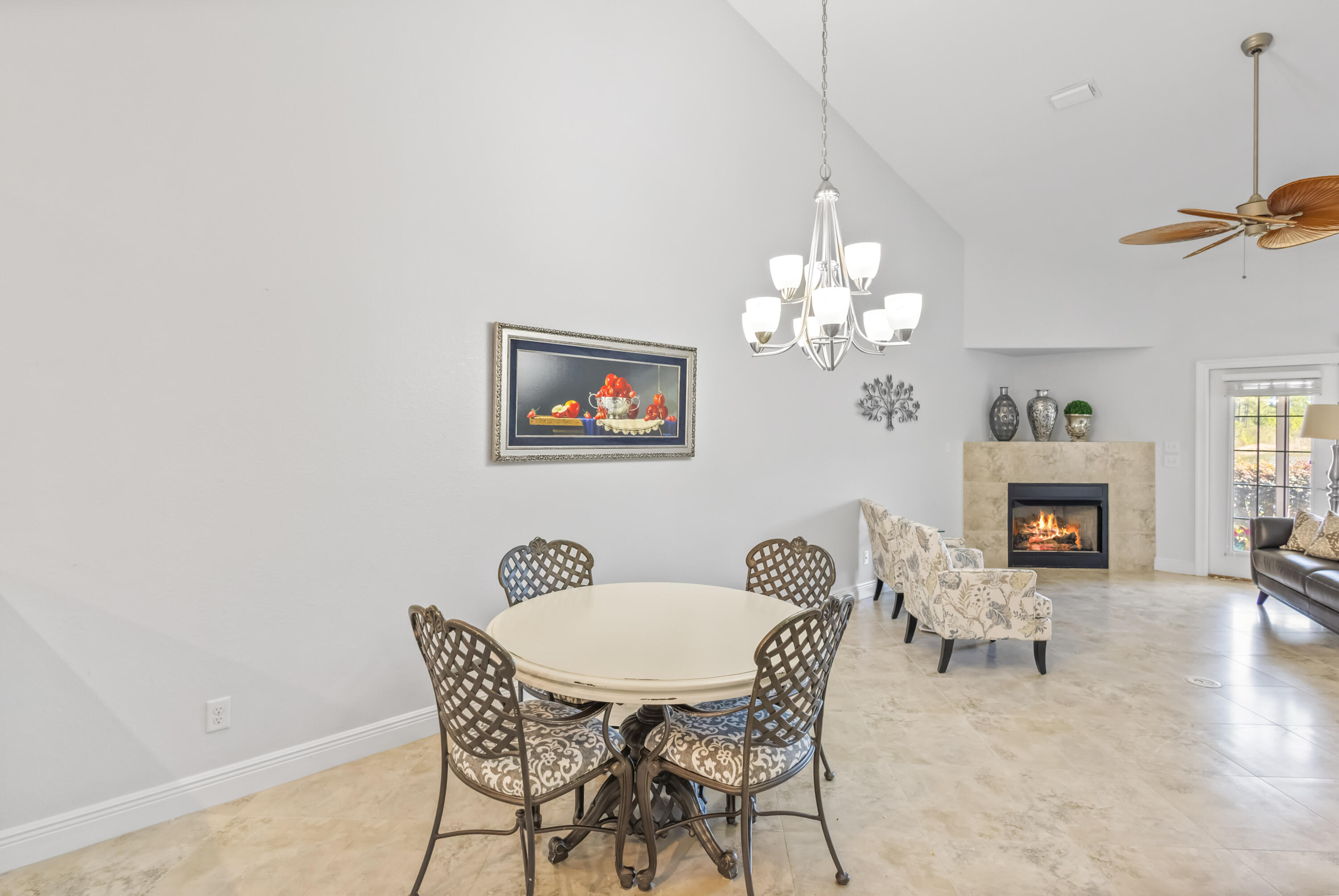 4248 Jade Loop Destin, FL 32541 - Photo 12 of 46 a view of a dining room with furniture and a chandelier