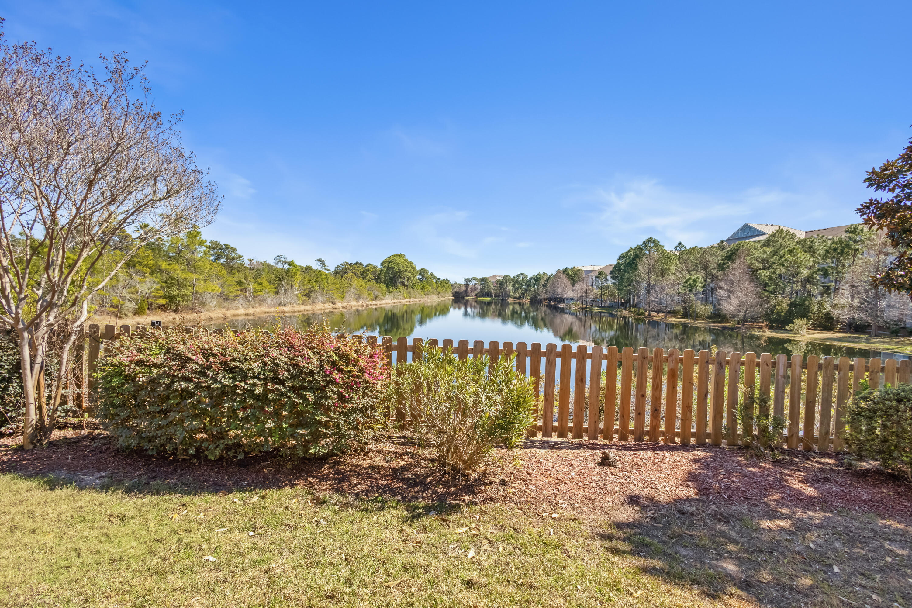 4248 Jade Loop Destin, FL 32541 - Photo 30 of 46 a view of a pathway with a wrought fence