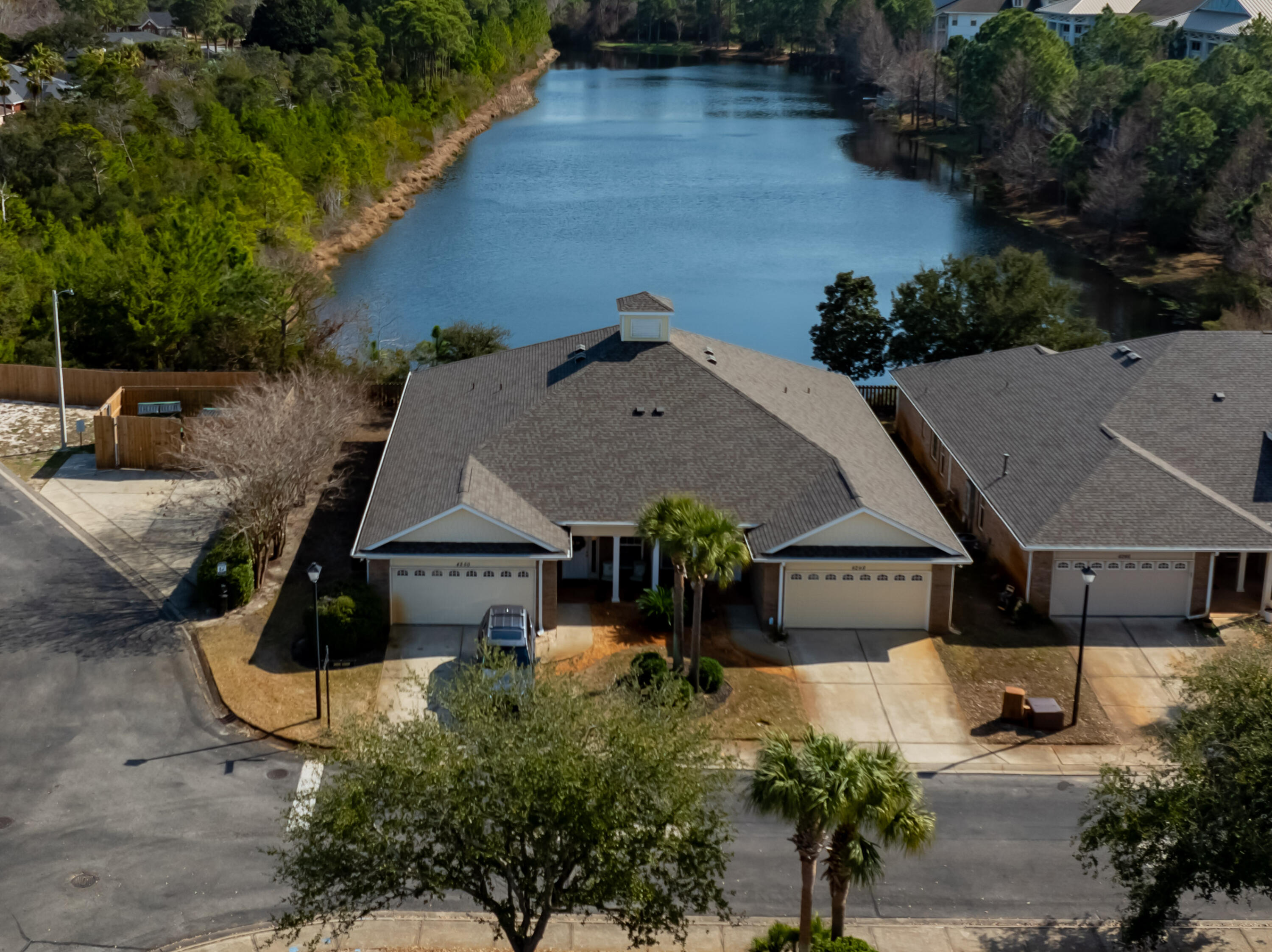 4248 Jade Loop Destin, FL 32541 - Photo 33 of 46 an aerial view of a house with garden space and street view