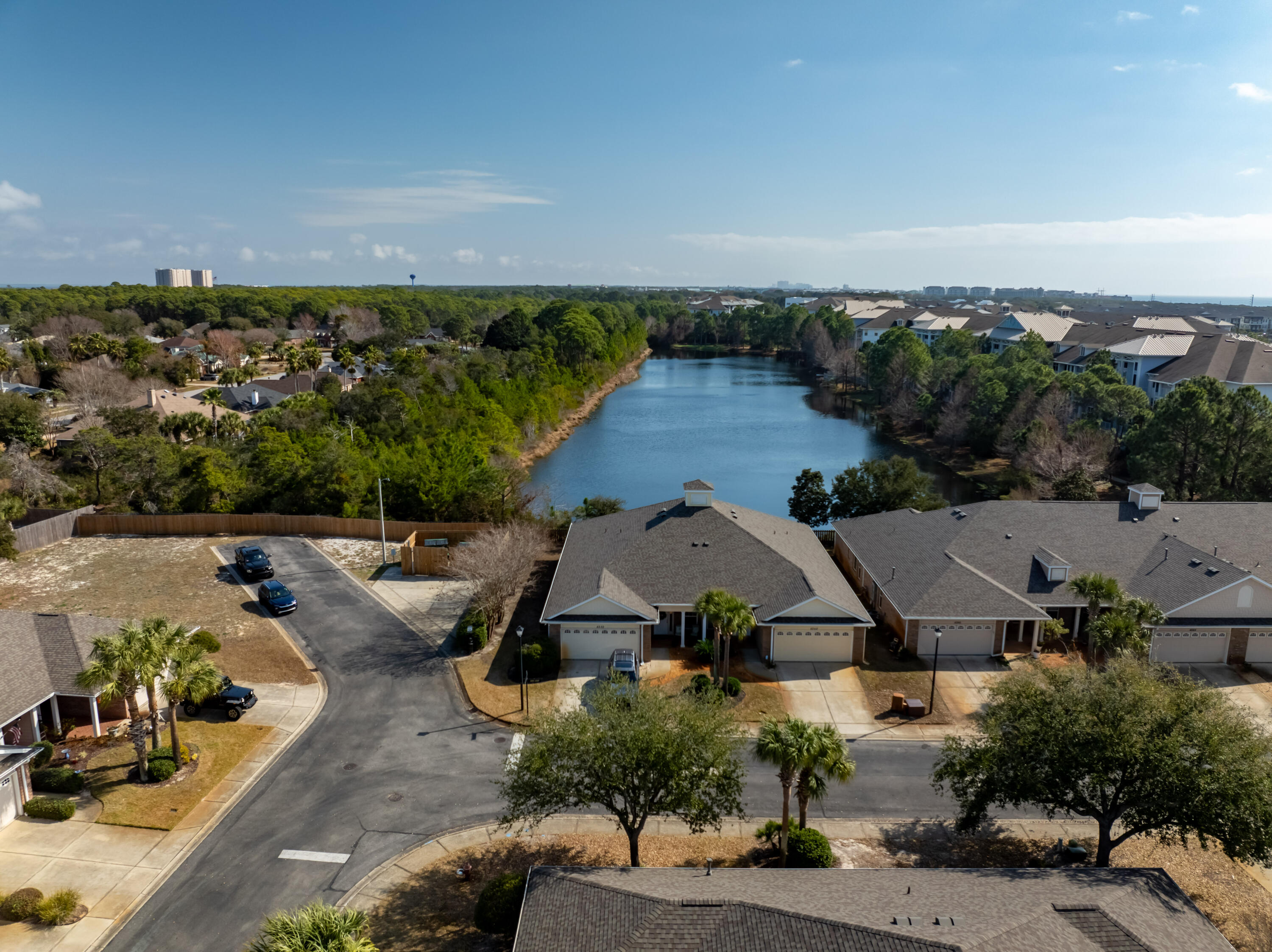 4248 Jade Loop Destin, FL 32541 - Photo 34 of 46 an aerial view of a house with swimming pool and outdoor seating