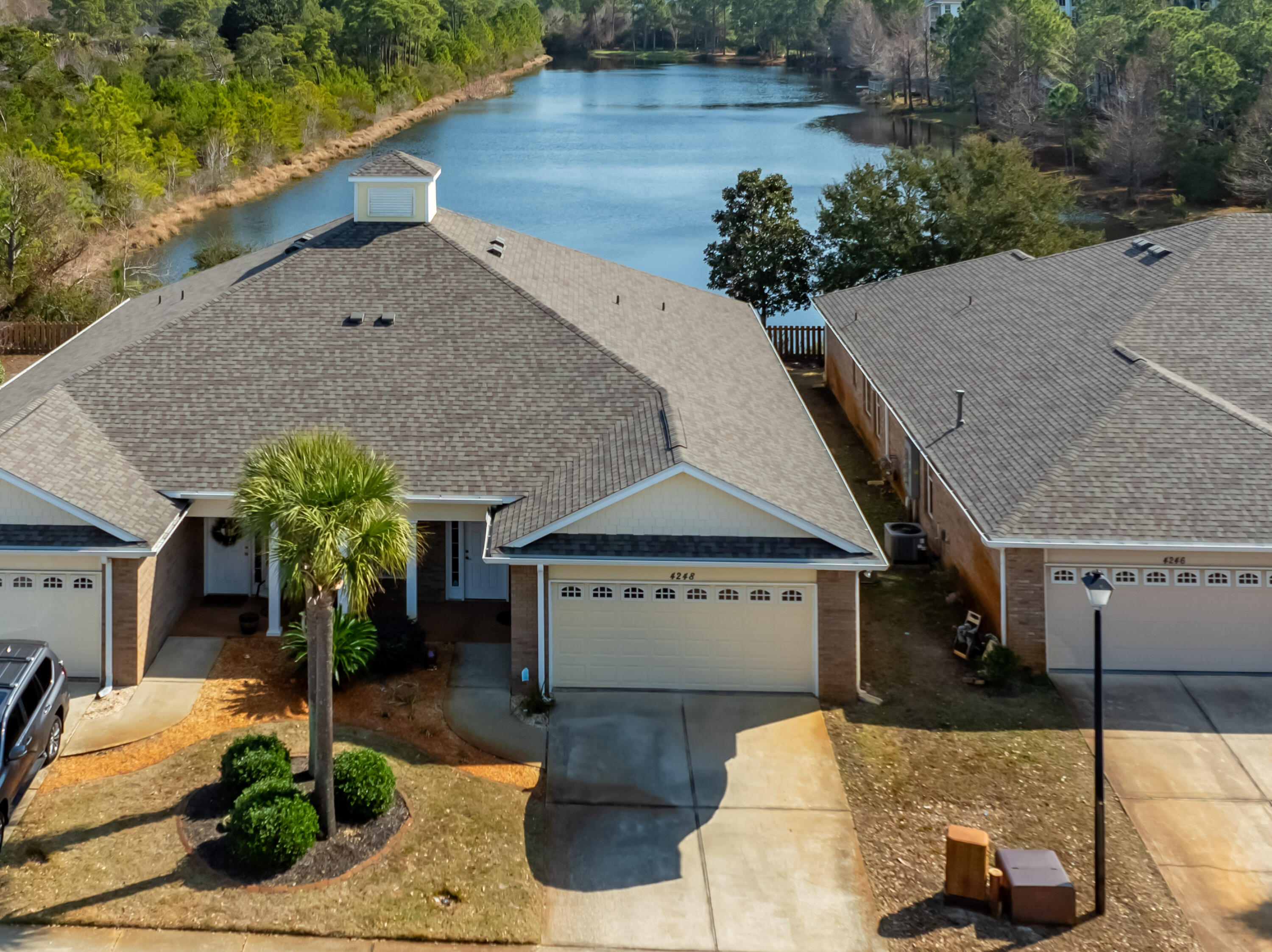 4248 Jade Loop Destin, FL 32541 - Photo 41 of 46 a view of entryway and hall with wooden floor