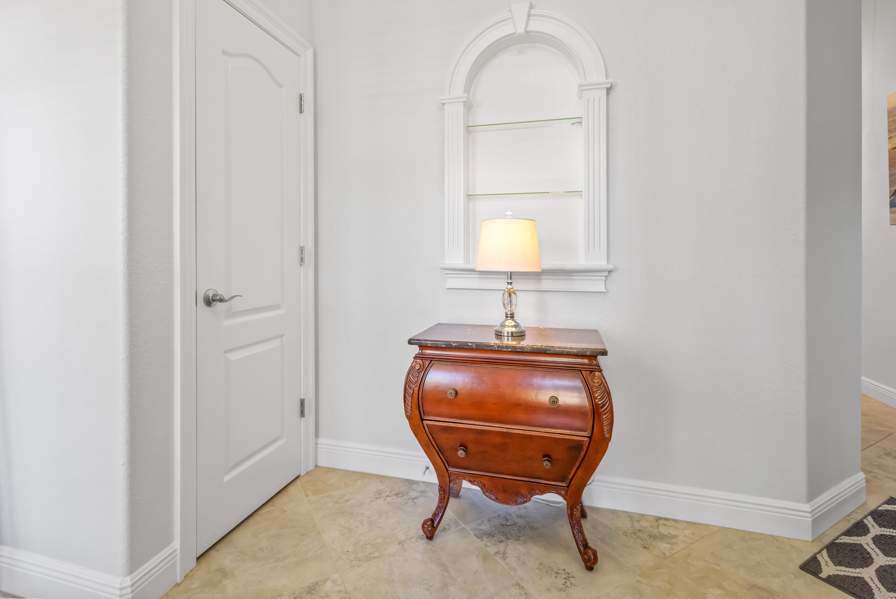 4248 Jade Loop Destin, FL 32541 - Photo 6 of 46 a room with table and flowerpot