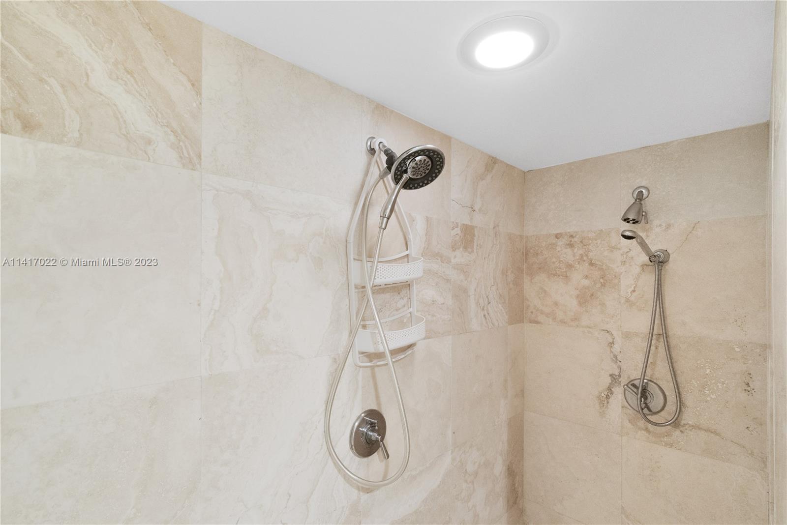 3540 Main Highway, Unit 309 Miami, FL 33133 - Photo 25 of 34 a bathroom with a shower