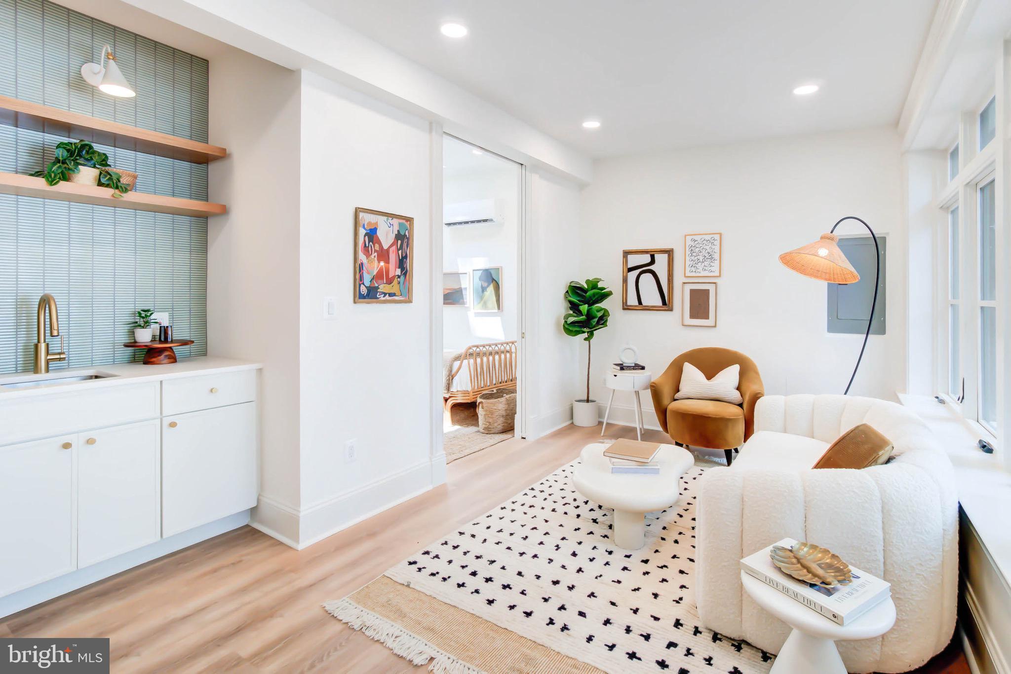 311 5th Street Southeast Washington, DC 20003 - Photo 19 of 21 a living room with a couch