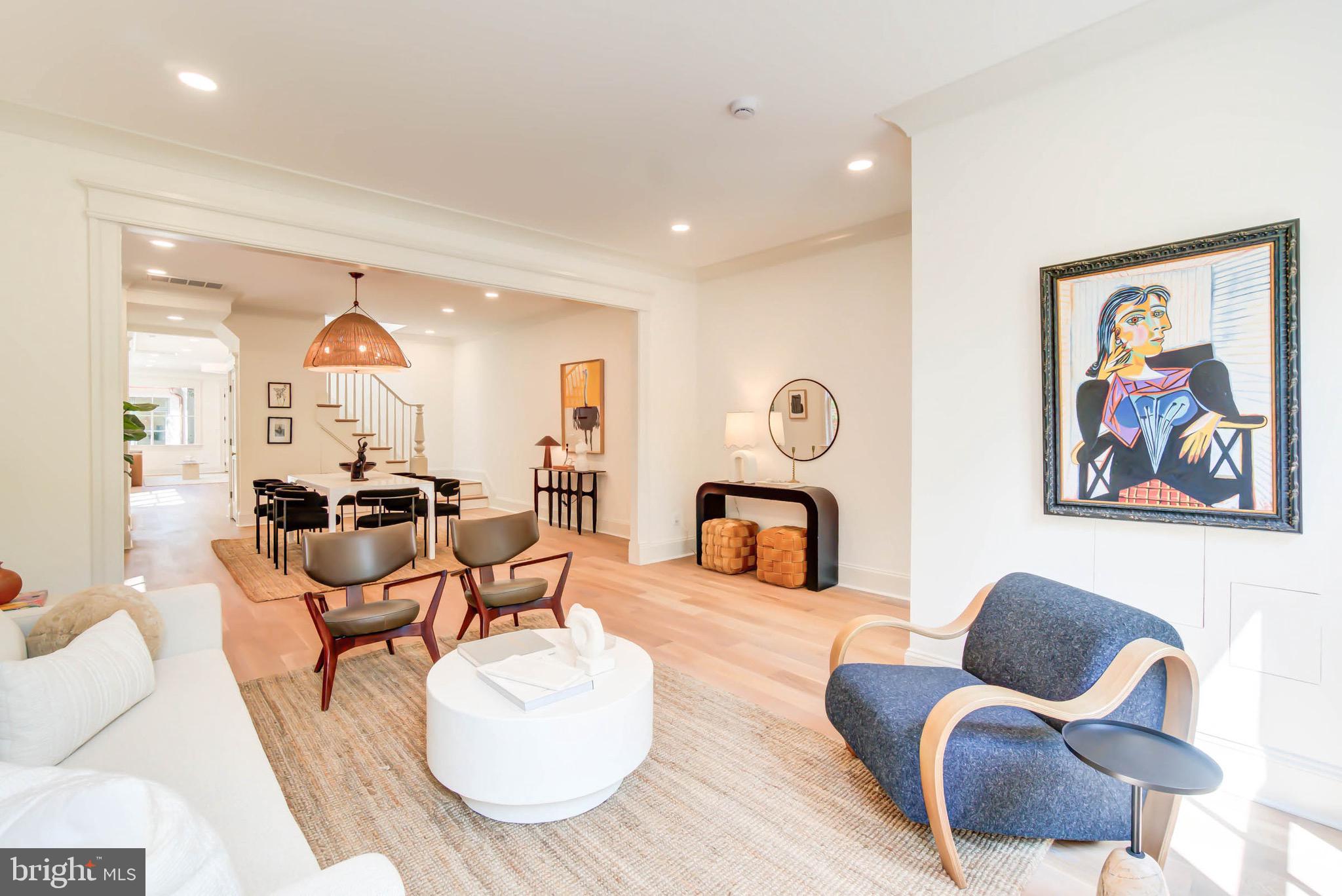 311 5th Street Southeast Washington, DC 20003 - Photo 6 of 21 a living room with furniture and a fireplace