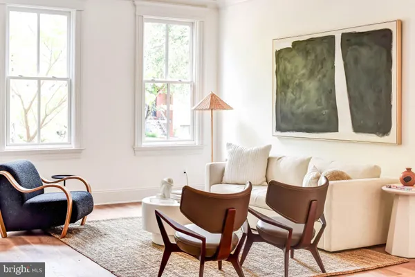 a living room with furniture and a window