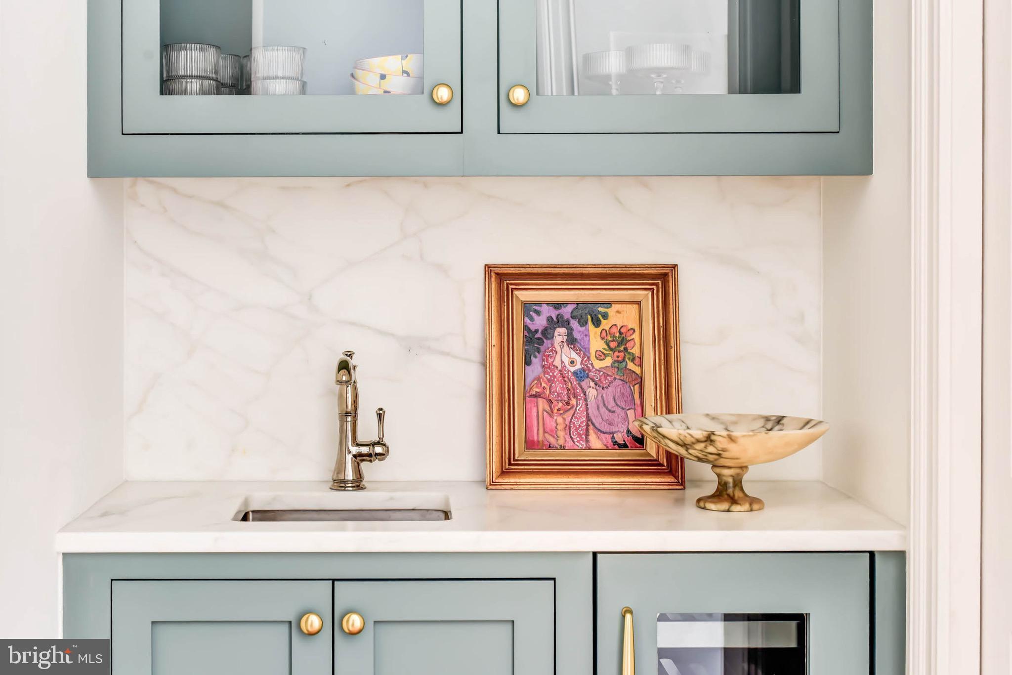 311 5th Street Southeast Washington, DC 20003 - Photo 9 of 21 a bathroom with a sink and a mirror