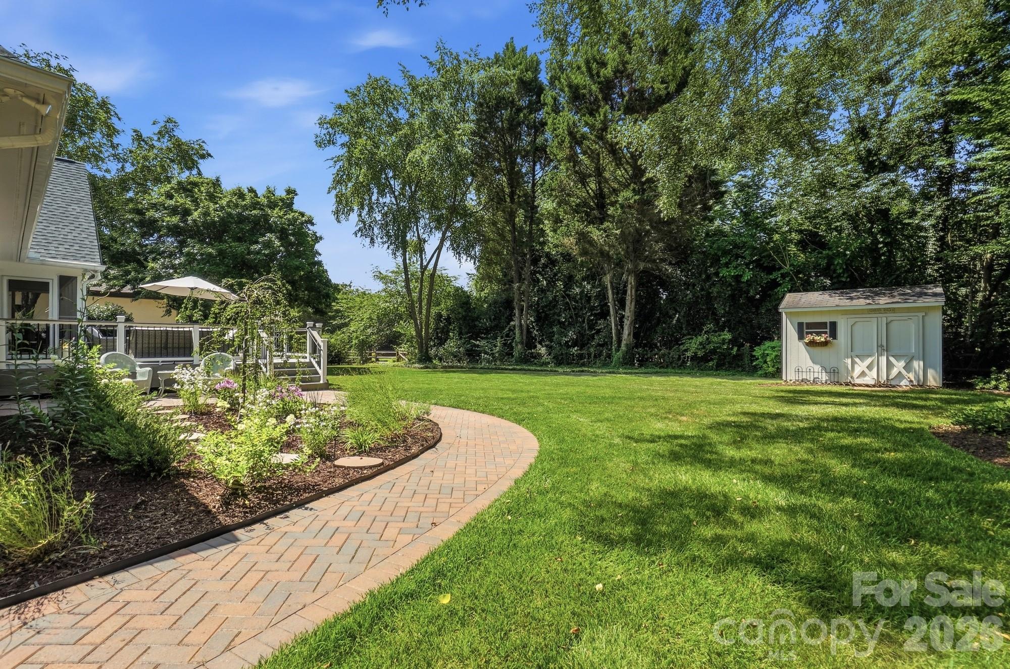 1136 Concord Road Davidson, NC 28036 - Photo 27 of 34 a view of a house with a yard