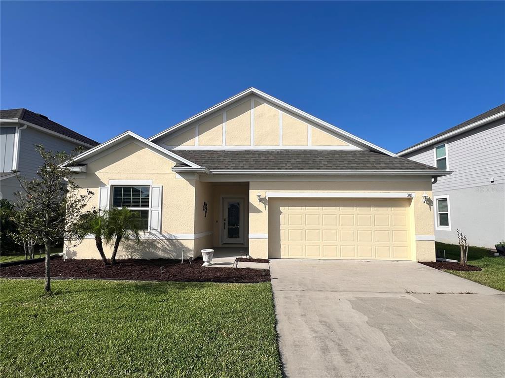 301 Jackson Loop DeLand, FL 32724 - Photo 2 of 22 a view of a house with backyard