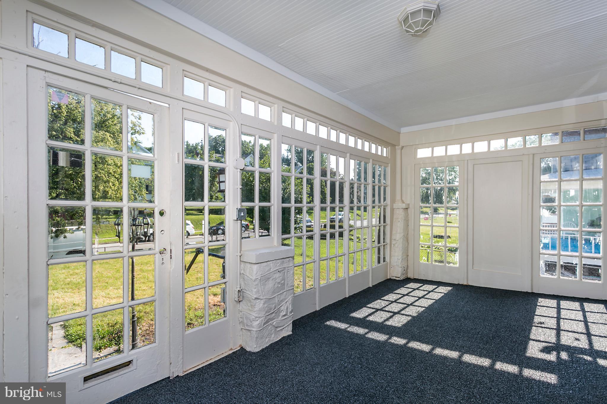 4007 Chatham Road Baltimore, MD 21207 - Photo 3 of 18 Sun room with tons of natural light!