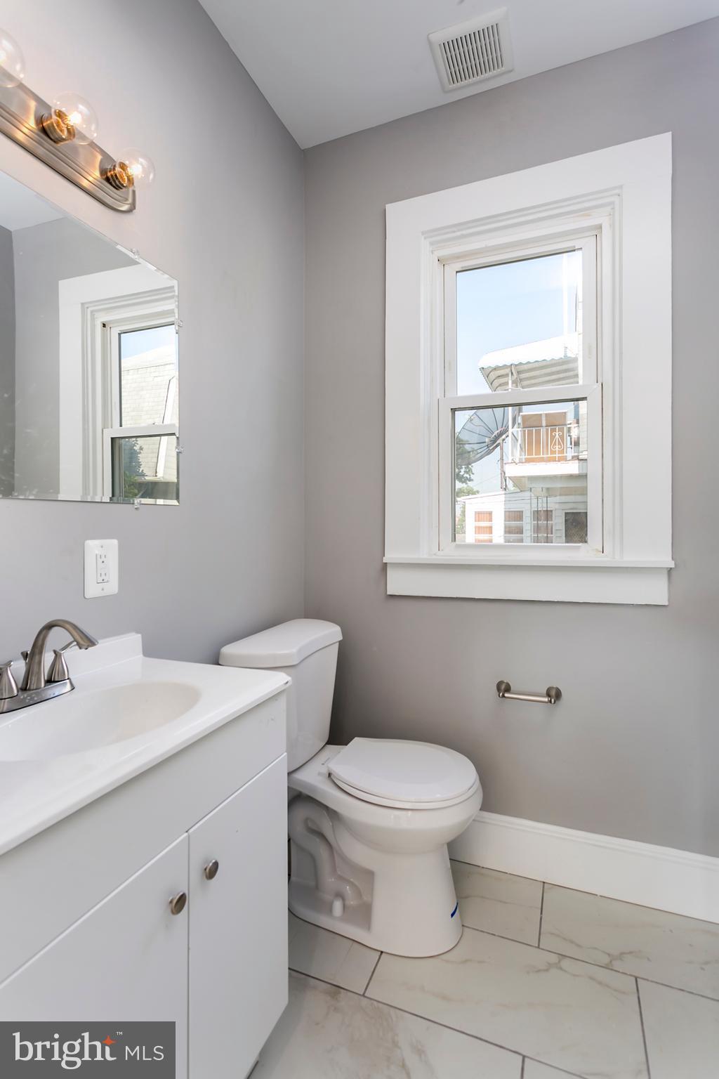 4007 Chatham Road Baltimore, MD 21207 - Photo 10 of 18 Half bathroom on main floor!