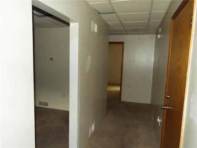 a view of an empty room and window