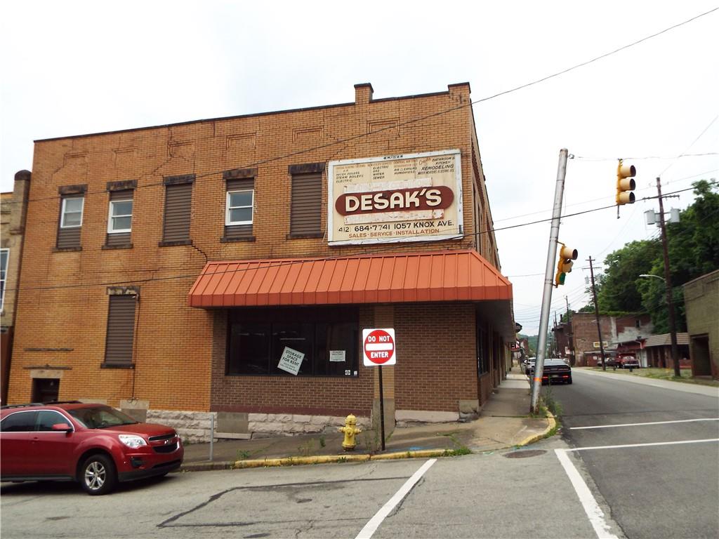 559 Schoonmaker Avenue Monessen, PA 15062 - Photo 2 of 50 a view of a building with car parked