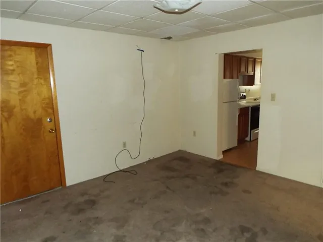 a bathroom with a toilet and a bathtub