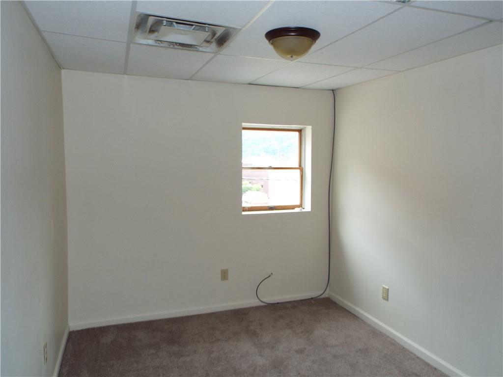 559 Schoonmaker Avenue Monessen, PA 15062 - Photo 3 of 50 an empty room with windows