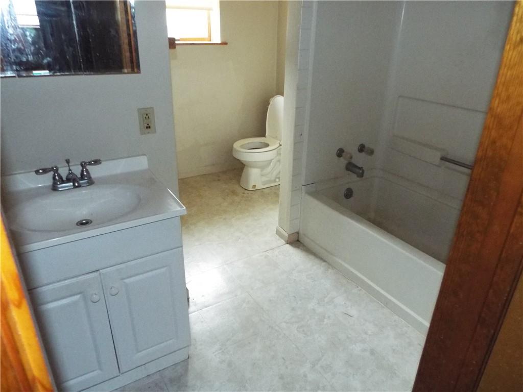 559 Schoonmaker Avenue Monessen, PA 15062 - Photo 32 of 50 a bathroom with a sink a toilet and shower