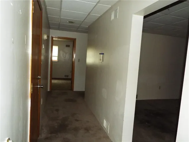 a view of a hallway with closet area