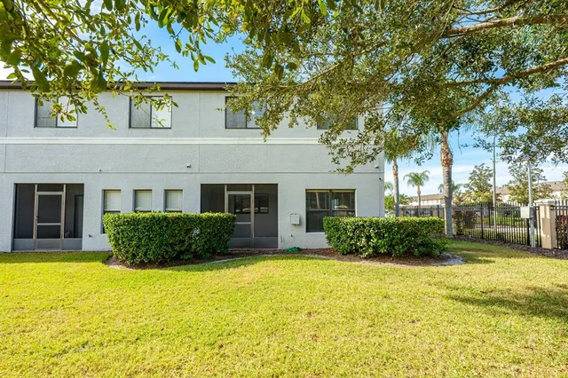 a view of a house with a swimming pool
