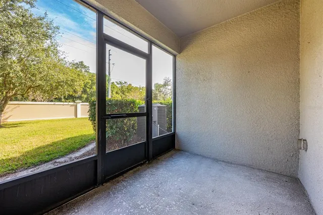 a view of an outdoor space with a large window