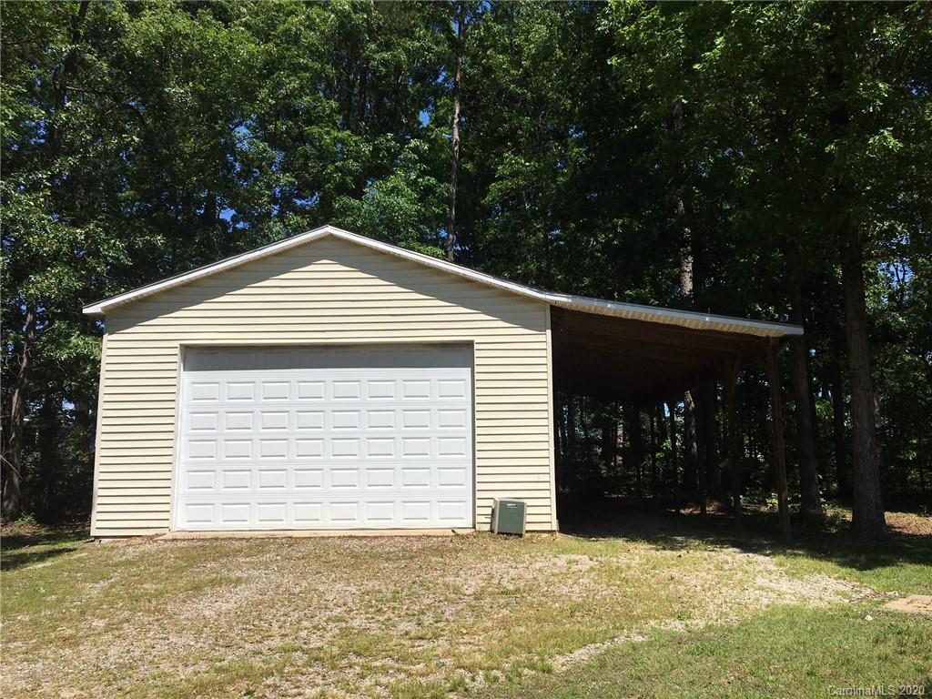 3226 Neal Boyce Road Monroe, NC 28110 - Photo 3 of 3 a front view of a house with a yard