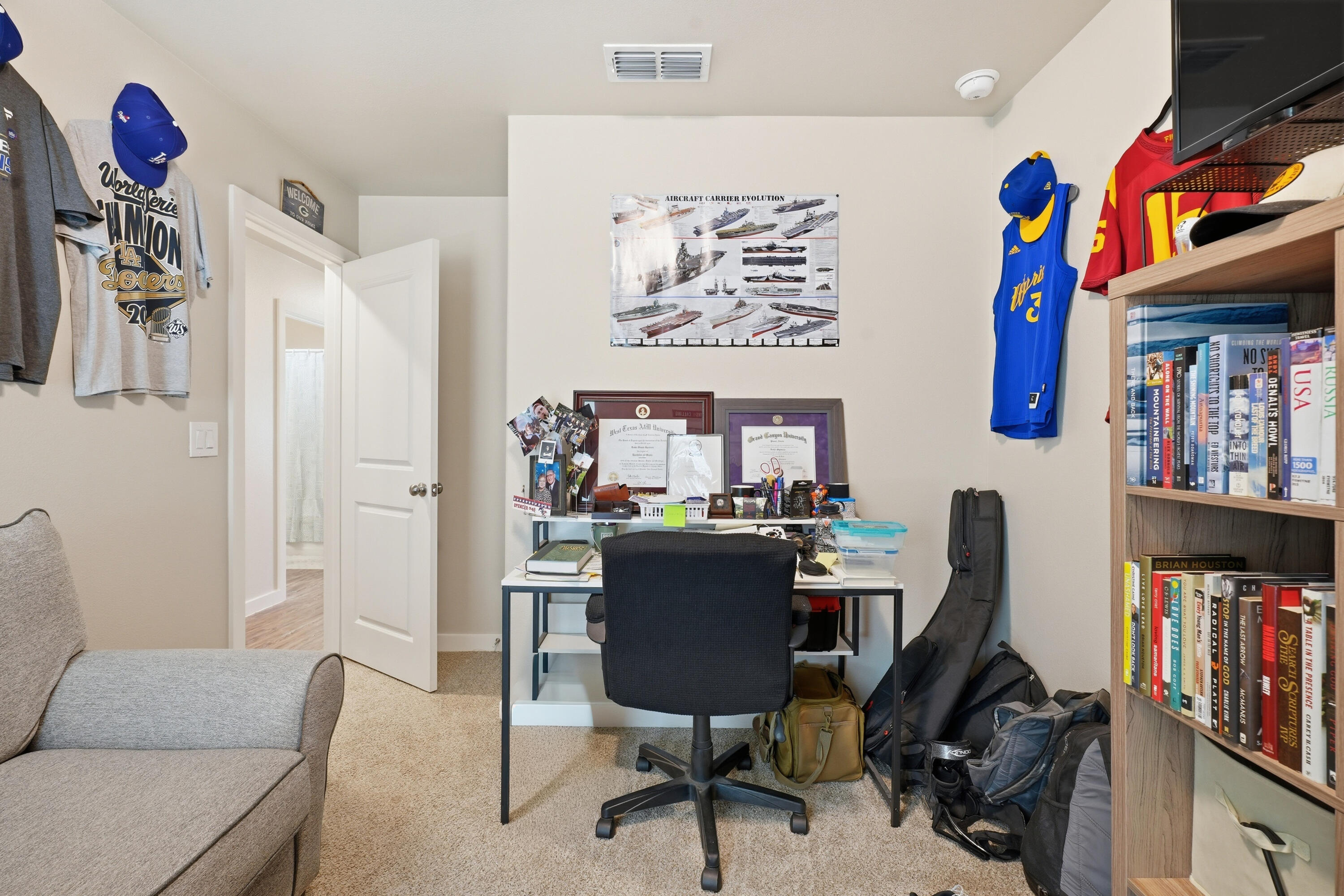 1605 135th Street Lubbock, TX 79423 - Photo 16 of 21 a view of a workspace with furniture and toys