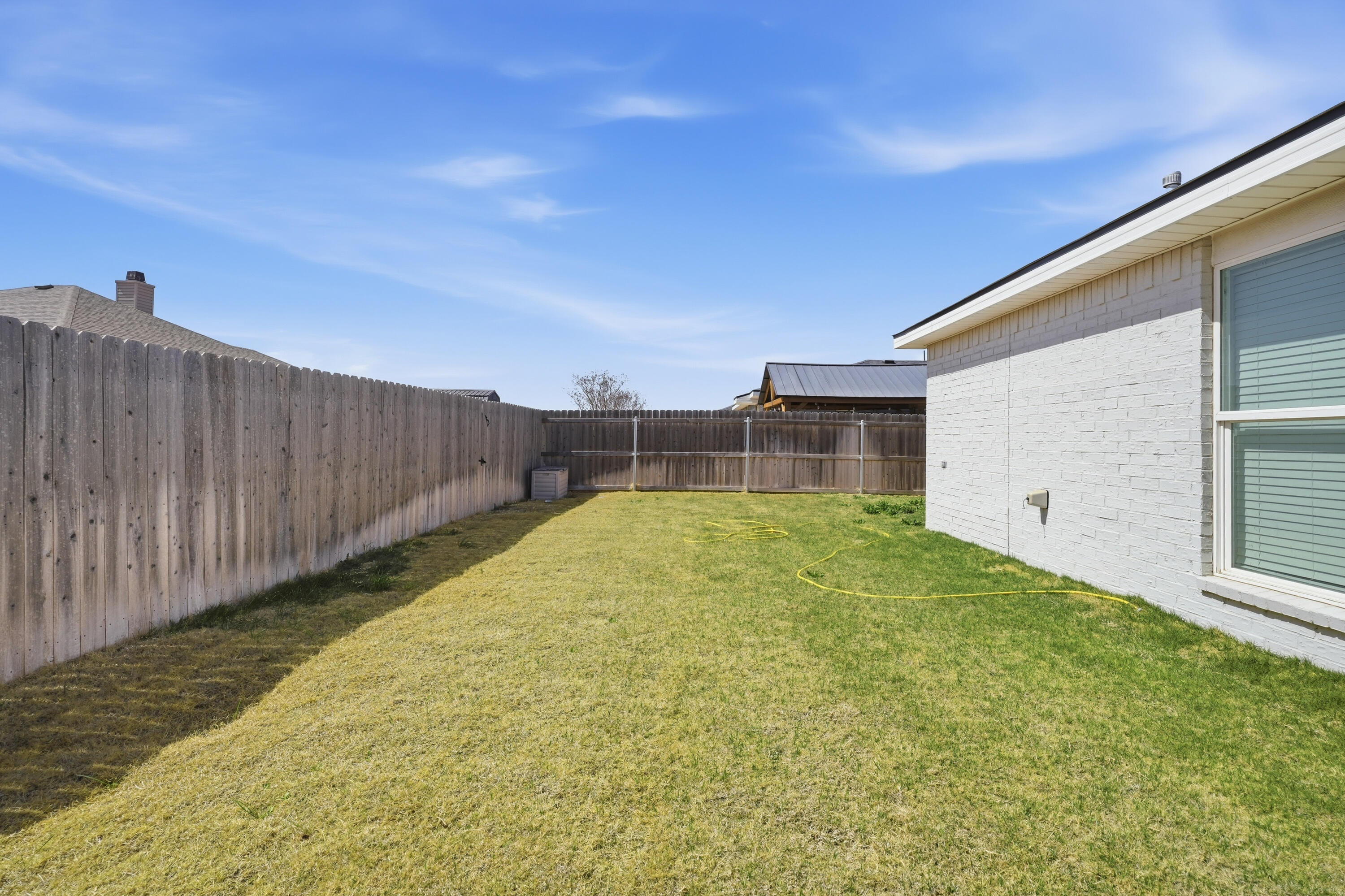 1605 135th Street Lubbock, TX 79423 - Photo 21 of 21 a view of a backyard