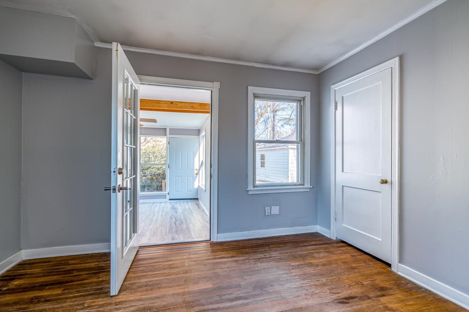 4430 Boyce Road Memphis, TN 38117 - Photo 15 of 25 a view of empty room with wooden floor and fan