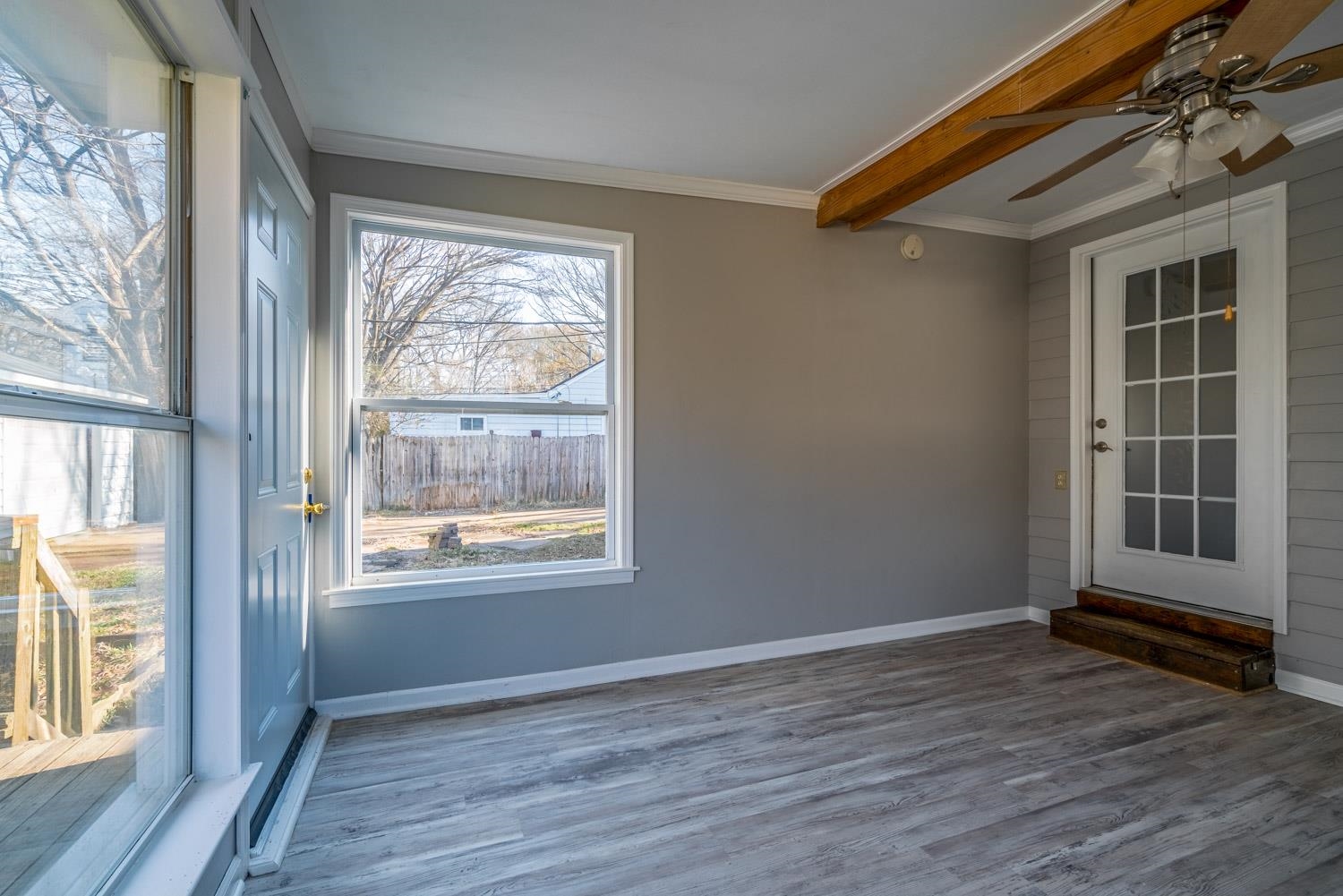 4430 Boyce Road Memphis, TN 38117 - Photo 18 of 25 a view of an empty room with wooden floor and a window